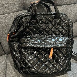 MzWallace Black laquer Quilted Women's Bag top handle
No rips